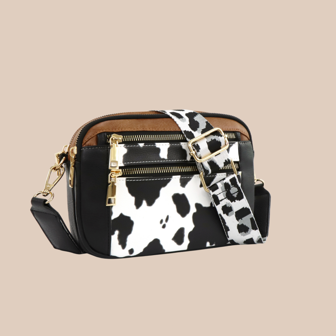 Small pu leather cow pattern - Lizi Yarce Accesories